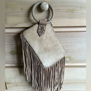 EUC Fringed Tan Leather clutch